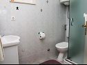 Apartments Jela - 50 m from pebble beach: A1-Ana (4), A2-Marija (4) Postira - Island Brac  - Apartment - A1-Ana (4): bathroom with toilet