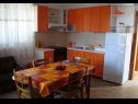 Apartments Nikša - 10 m from beach: A1 Narancasti(5), A2 Zeleni(3) Postira - Island Brac  - Apartment - A1 Narancasti(5): kitchen and dining room