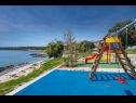 Apartments Rajka - 20 m from beach: Rajka(4) Koromacno - Istria  - children playground