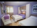Apartments Palmina - comfort apartment: A1 veliki (6),  A2 žuti (4+1), A3 lila (2), SA4 bijeli (2) Makarska - Riviera Makarska  - Apartment - A1 veliki (6): bedroom
