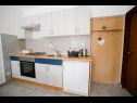 Apartments Petri - close to the sea: A1 Crveni (2+1), A2 Zuti (2+1), A3 Sivi (2+1) Tisno - Island Murter  - Apartment - A3 Sivi (2+1): kitchen
