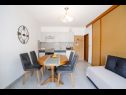 Apartments Petri - close to the sea: A1 Crveni (2+1), A2 Zuti (2+1), A3 Sivi (2+1) Tisno - Island Murter  - Apartment - A3 Sivi (2+1): kitchen and dining room