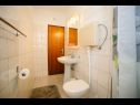 Apartments Petri - close to the sea: A1 Crveni (2+1), A2 Zuti (2+1), A3 Sivi (2+1) Tisno - Island Murter  - Apartment - A3 Sivi (2+1): bathroom with toilet