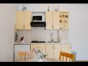 Apartments Petri - close to the sea: A1 Crveni (2+1), A2 Zuti (2+1), A3 Sivi (2+1) Tisno - Island Murter  - Apartment - A2 Zuti (2+1): kitchen