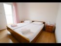 Apartments Petri - close to the sea: A1 Crveni (2+1), A2 Zuti (2+1), A3 Sivi (2+1) Tisno - Island Murter  - Apartment - A1 Crveni (2+1): bedroom