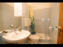 Apartments Petri - close to the sea: A1 Crveni (2+1), A2 Zuti (2+1), A3 Sivi (2+1) Tisno - Island Murter  - Apartment - A1 Crveni (2+1): bathroom with toilet