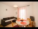 Apartments Petri - close to the sea: A1 Crveni (2+1), A2 Zuti (2+1), A3 Sivi (2+1) Tisno - Island Murter  - Apartment - A1 Crveni (2+1): dining room