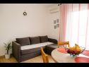 Apartments Petri - close to the sea: A1 Crveni (2+1), A2 Zuti (2+1), A3 Sivi (2+1) Tisno - Island Murter  - Apartment - A1 Crveni (2+1): living room