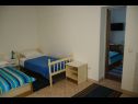 Apartments Zdravko - 150 m from sandy beach: SA1(3), SA2(3), A3(5) Duce - Riviera Omis  - Apartment - A3(5): bedroom