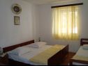 Apartments Stric - 10 m from beach: A1(8+1) Dugi Rat - Riviera Omis  - Apartment - A1(8+1): bedroom