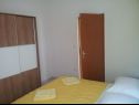 Apartments Vana - sea view A1(2+2), A2(2+2) Lokva Rogoznica - Riviera Omis  - Apartment - A1(2+2): bedroom