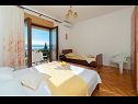 Apartments Franka - beautiful sea view & parking: A1(3), A2(2+2), A3(2+2), A4(3+1) Stanici - Riviera Omis  - Apartment - A1(3): bedroom