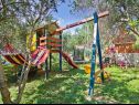 Apartments Spomenka - green paradise; A1(4+1), A2(4+1), A3(6) Palit - Island Rab  - children playground