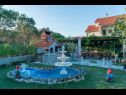 Apartments Mig - with beautiful garden: A1(2+1), A3(4+1), A4(4+1) Supetarska Draga - Island Rab  - courtyard