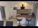 Apartments Matko-200m from the beach: A1 sjever(2+2), A2 jug(2+2), A3(6+2) Kastel Stafilic - Riviera Split  - Apartment - A3(6+2): kitchen and dining room