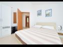 Apartments Ljuba - 200m from beach: A1-Istočni (2+2) , A2-Zapadni (2+2) Cove Ljubljeva (Vinisce) - Riviera Trogir  - Apartment - A2-Zapadni (2+2): bedroom
