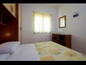 Apartments Mare - 30 m from pebble beach: SA1(2), SA2(2), A3(4), A4(4), A5(8) Seget Vranjica - Riviera Trogir  - Apartment - A3(4): bedroom