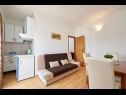 Apartments Mare - 30 m from pebble beach: SA1(2), SA2(2), A3(4), A4(4), A5(8) Seget Vranjica - Riviera Trogir  - Apartment - A3(4): living room