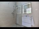 Apartments Vera - with nice view: A2-prvi kat (6), A1-prizemlje(4), A3-potkrovlje(6) Trogir - Riviera Trogir  - Apartment - A1-prizemlje(4): bathroom with toilet