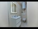 Apartments Vera - with nice view: A2-prvi kat (6), A1-prizemlje(4), A3-potkrovlje(6) Trogir - Riviera Trogir  - Apartment - A1-prizemlje(4): bathroom with toilet