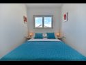 Apartments Vera - with nice view: A2-prvi kat (6), A1-prizemlje(4), A3-potkrovlje(6) Trogir - Riviera Trogir  - Apartment - A1-prizemlje(4): bedroom