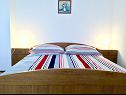 Apartments Ivo - barbecue: A1(2+1) Vinisce - Riviera Trogir  - Apartment - A1(2+1): bedroom
