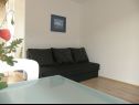 Apartments Ljubi - 20 m from beach: A1(4+1), A2 Crveni(2+2), A3 Zeleni(2+2) Vinisce - Riviera Trogir  - Apartment - A2 Crveni(2+2): living room