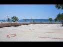 Apartments Sor - on the beach: SA1(2+1), A1(4+1), A2(2+2), A3(2+2) Bibinje - Zadar riviera  - parking (house and surroundings)