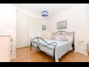 Apartments Sim - 130 m from sea: A1 Zuti(2+2), A2 Crveni(2+2) Bol - Island Brac  - Apartment - A2 Crveni(2+2): bedroom