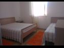 Apartments Nikša - 10 m from beach: A1 Narancasti(5), A2 Zeleni(3) Postira - Island Brac  - Apartment - A1 Narancasti(5): bedroom