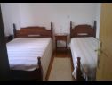 Apartments Nikša - 10 m from beach: A1 Narancasti(5), A2 Zeleni(3) Postira - Island Brac  - Apartment - A2 Zeleni(3): bedroom