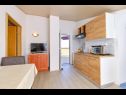 Apartments Nada - 150 m from sea: A3(2), A2(2), A1(2) Mali Losinj - Island Losinj  - Apartment - A3(2): kitchen and dining room