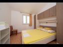 Apartments Ruzica - with sea view: A1 - plavi(3+2), A2 - (2+2), A3 - zuti(3+2) Igrane - Riviera Makarska  - Apartment - A3 - zuti(3+2): bedroom