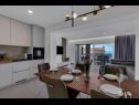Apartments Prgo - with view and parking: A1(6), A2(6), A3(4) Makarska - Riviera Makarska  - Apartment - A1(6): kitchen and dining room