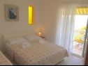 Apartments and rooms Gojko - 50 m from the beach: A1(9), A2(6), A3(2), A4(2+1), R3(2), R4(3) Zivogosce - Riviera Makarska  - Apartment - A2(6): bedroom