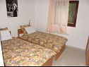 Apartments Ruzica - 50 m from sea: A1 Mali (2+1), A2 Veliki (4+1) Jezera - Island Murter  - Apartment - A2 Veliki (4+1): bedroom