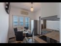 Apartments Nina - sea view family apartments SA1A(3), A1Donji(2+1), A3(6), A4(4+1), A5(6), A6(4) Celina Zavode - Riviera Omis  - Apartment - A3(6): kitchen and dining room