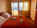 Apartments Paradiso with gorgeous sea view: A1 Doris (4+2), SA2 Petra (2+2), SA3 Nina (2) Lokva Rogoznica - Riviera Omis  - Apartment - A1 Doris (4+2): bedroom