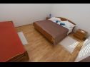 Apartments Stipica - 100 m from beach: A1(3+2), A3(2+2), SA4(2), A5(2+2) Ruskamen - Riviera Omis  - Apartment - A1(3+2): bedroom