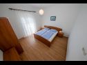 Apartments Coastal home - 10 m from the sea: A1(4+1), A2(2), A3(2+2), A4(4+1), A5(4+1) Supetarska Draga - Island Rab  - Apartment - A1(4+1): bedroom