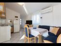 Apartments Petra - 50 m from pebble beach: A2-donji (4), A1-gornji (2+2) Necujam - Island Solta  - Apartment - A1-gornji (2+2): living room