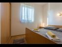 Apartments Petra - 50 m from pebble beach: A2-donji (4), A1-gornji (2+2) Necujam - Island Solta  - Apartment - A2-donji (4): bedroom